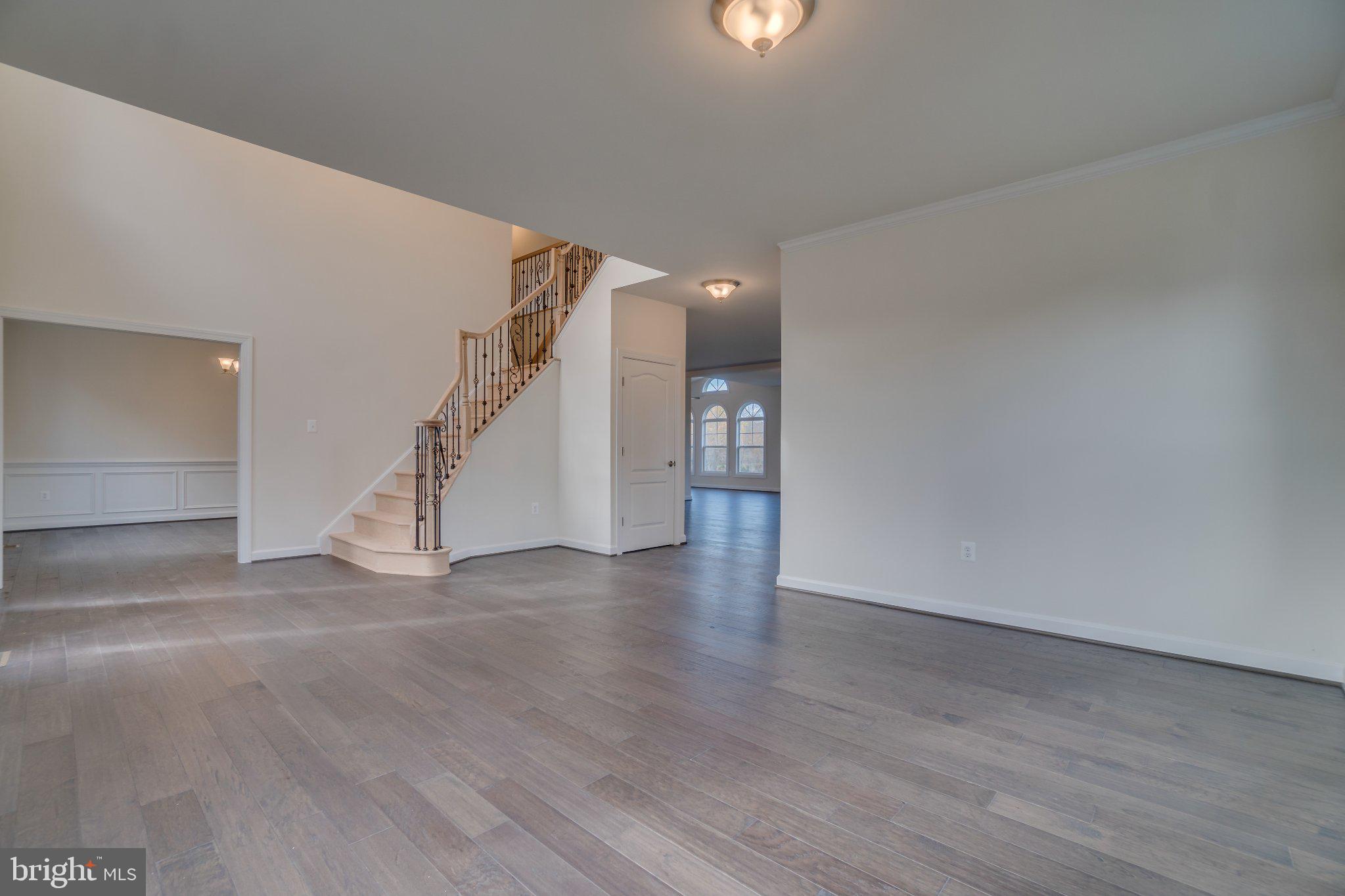 499 Joshua Road Stafford, VA 22556 - Photo 15 of 37 Spacious entryway with elegant staircase.