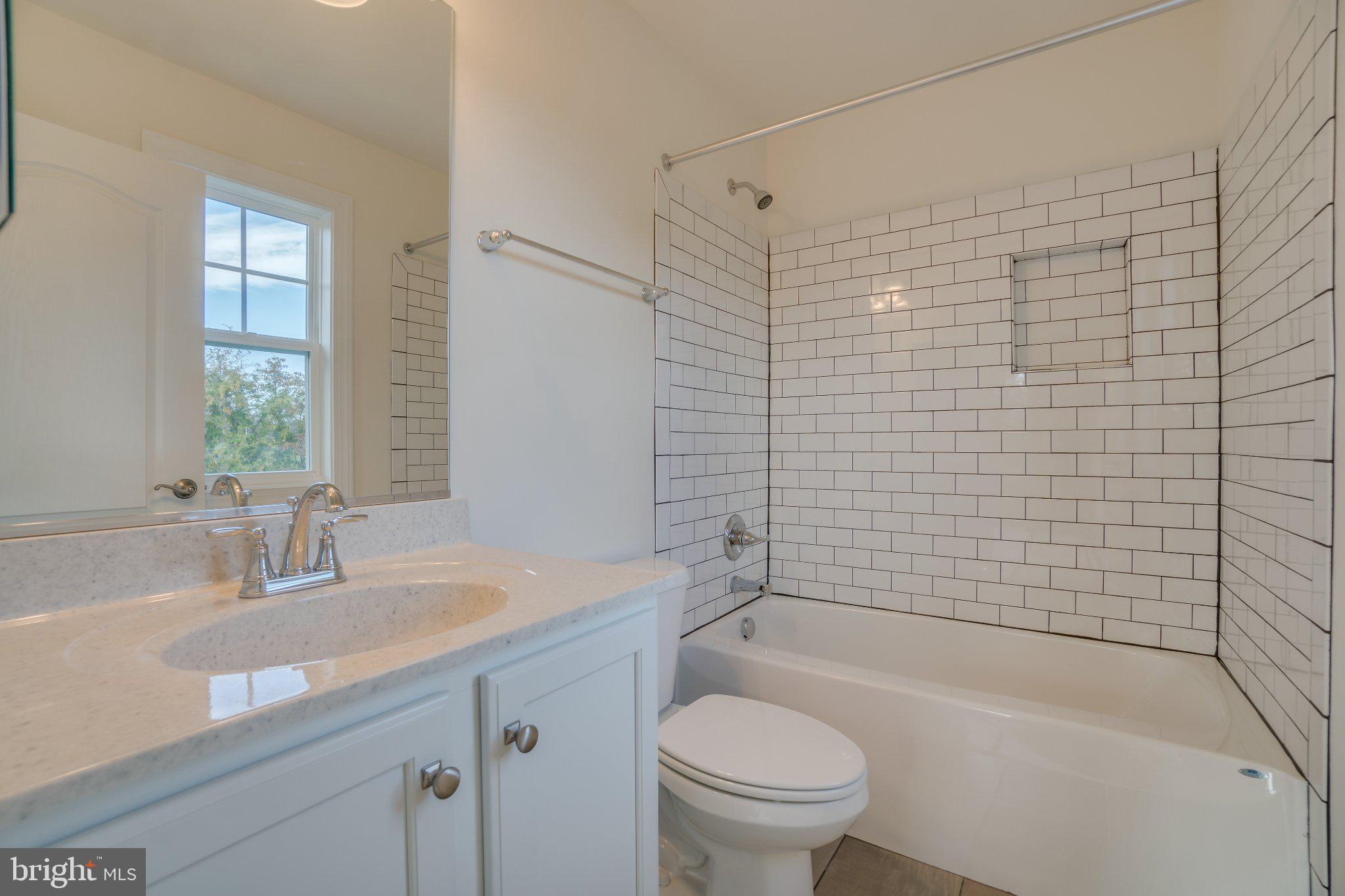 499 Joshua Road Stafford, VA 22556 - Photo 20 of 37 Modern bathroom with sleek finishes.