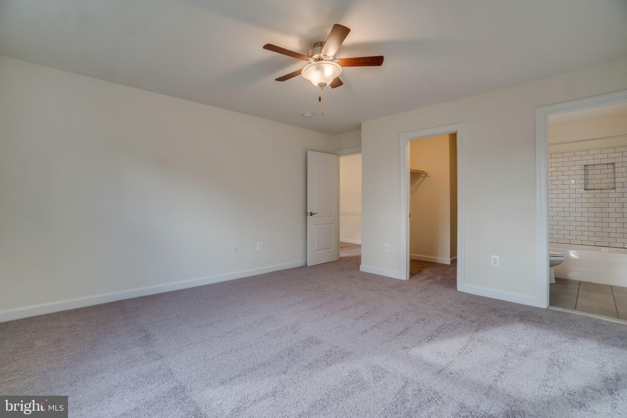 499 Joshua Road Stafford, VA 22556 - Photo 22 of 37 Spacious room with soft carpet and light.