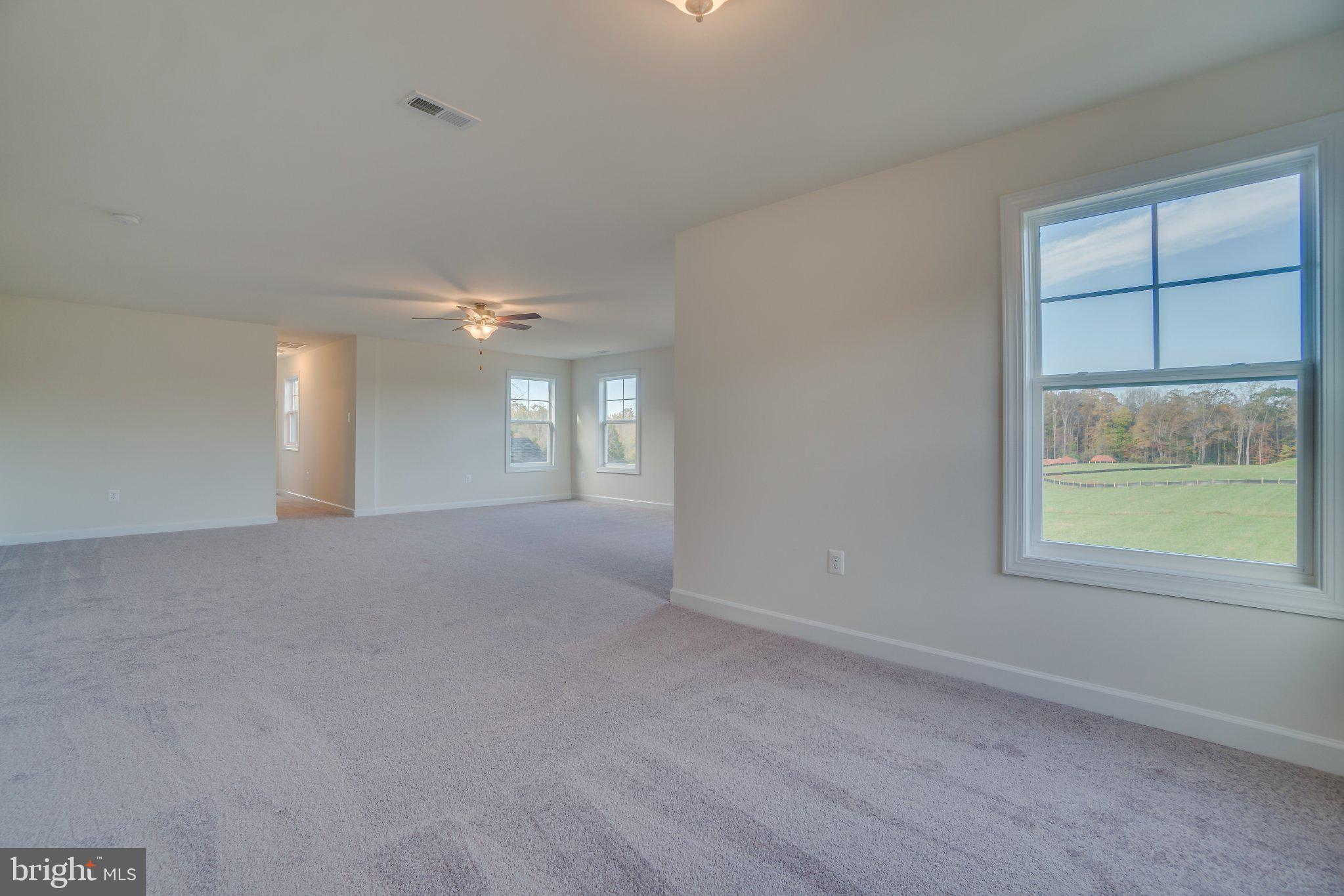 499 Joshua Road Stafford, VA 22556 - Photo 23 of 37 Spacious, sunlit open living area.
