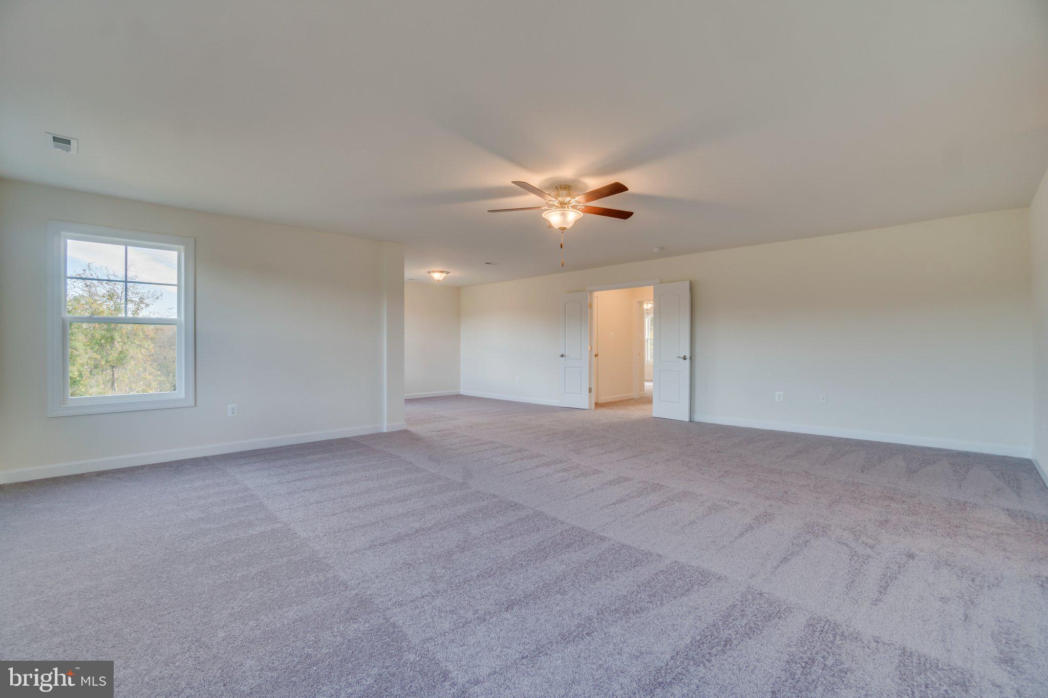 499 Joshua Road Stafford, VA 22556 - Photo 27 of 37 Spacious, light-filled living area.