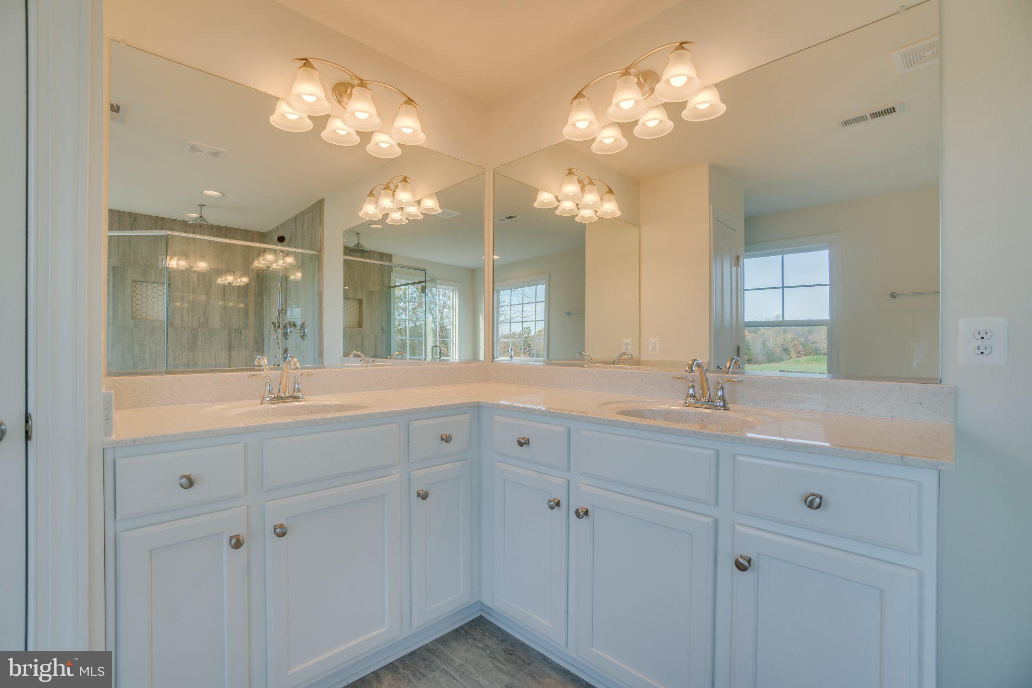 499 Joshua Road Stafford, VA 22556 - Photo 28 of 37 Elegant dual-sink bathroom oasis.