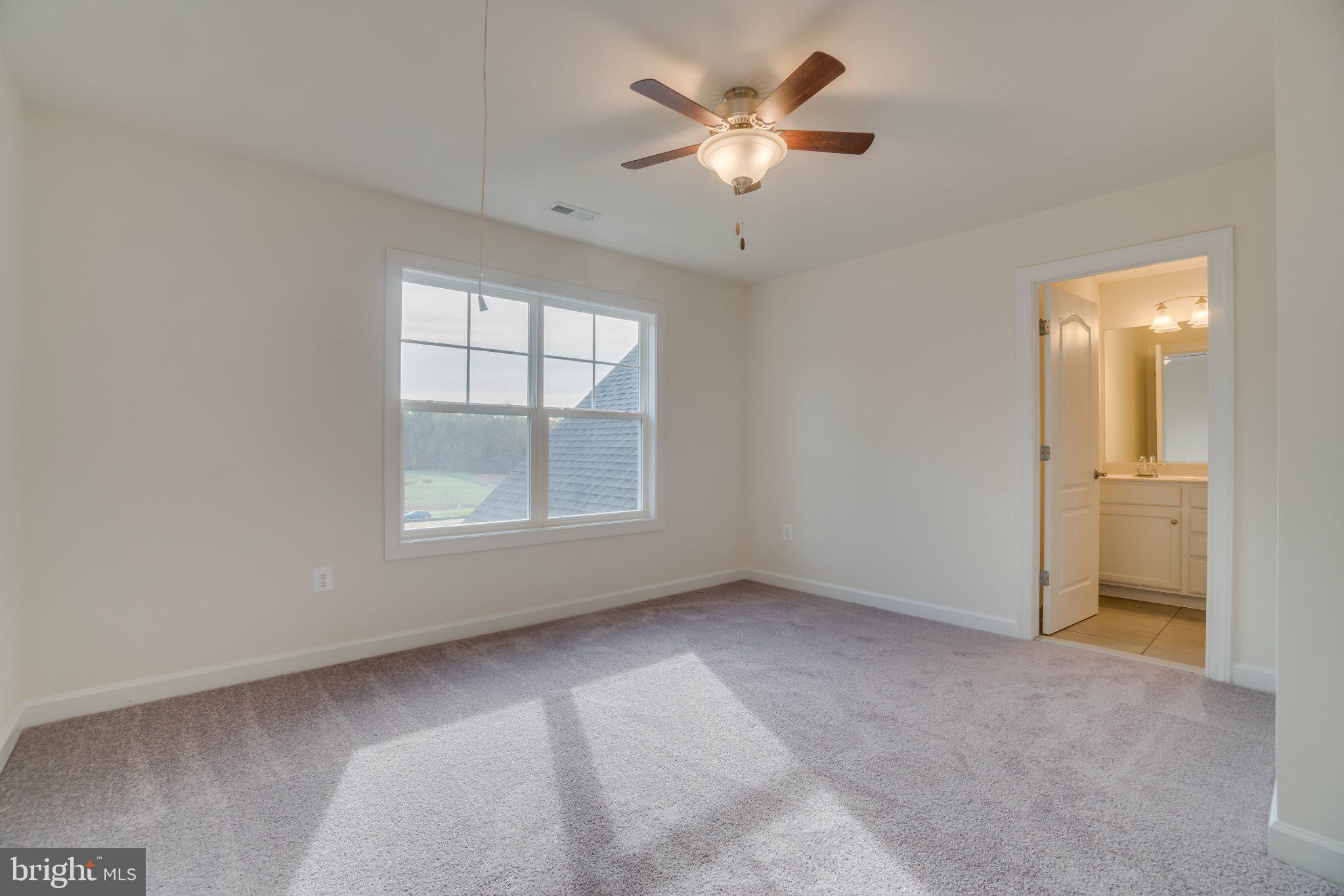 499 Joshua Road Stafford, VA 22556 - Photo 31 of 37 Bright and airy bedroom retreat.