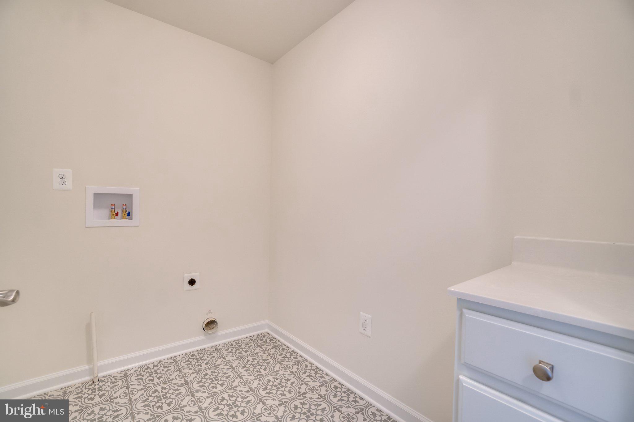 499 Joshua Road Stafford, VA 22556 - Photo 35 of 37 Bright and airy laundry space awaits.