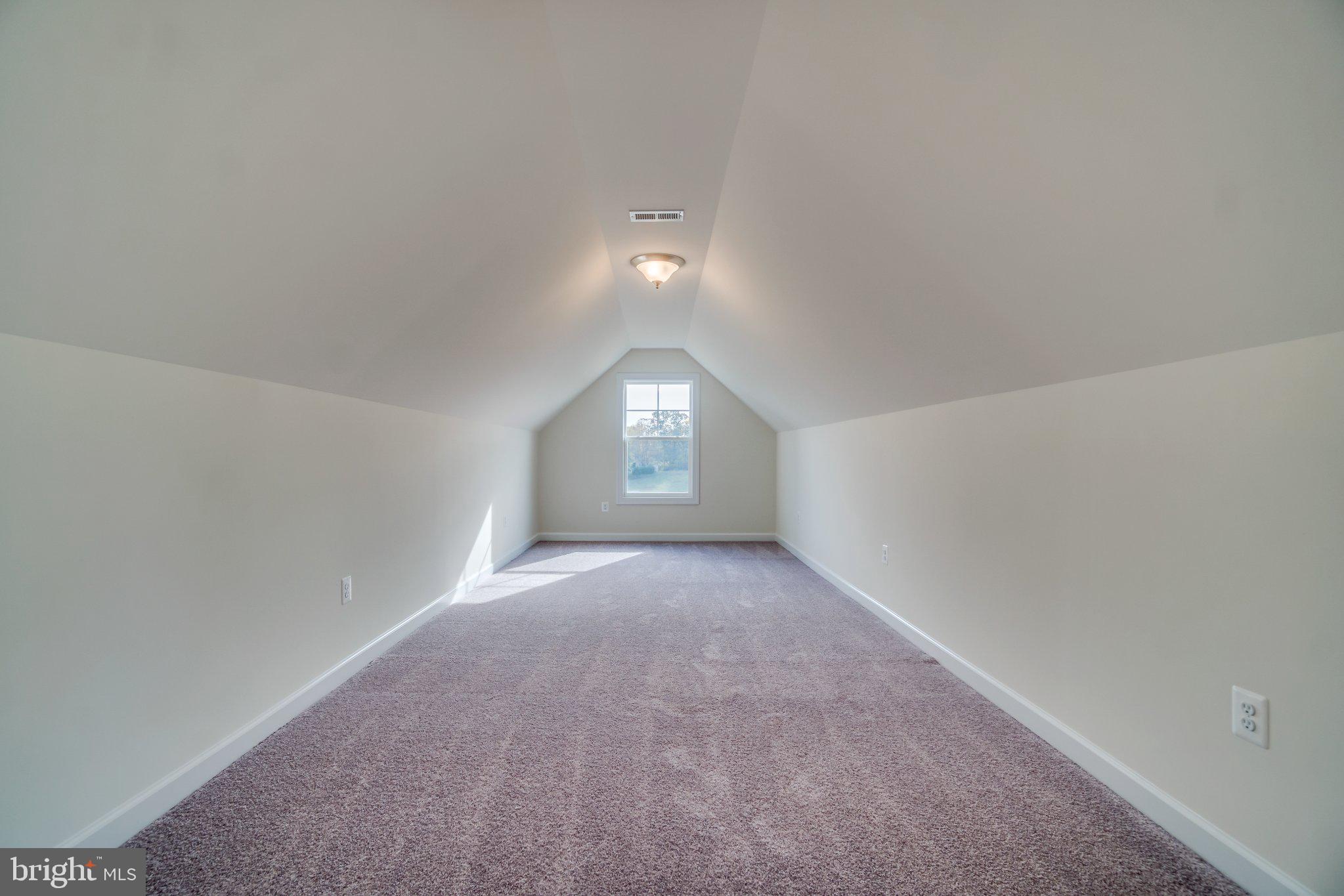 499 Joshua Road Stafford, VA 22556 - Photo 36 of 37 Spacious attic with natural light.