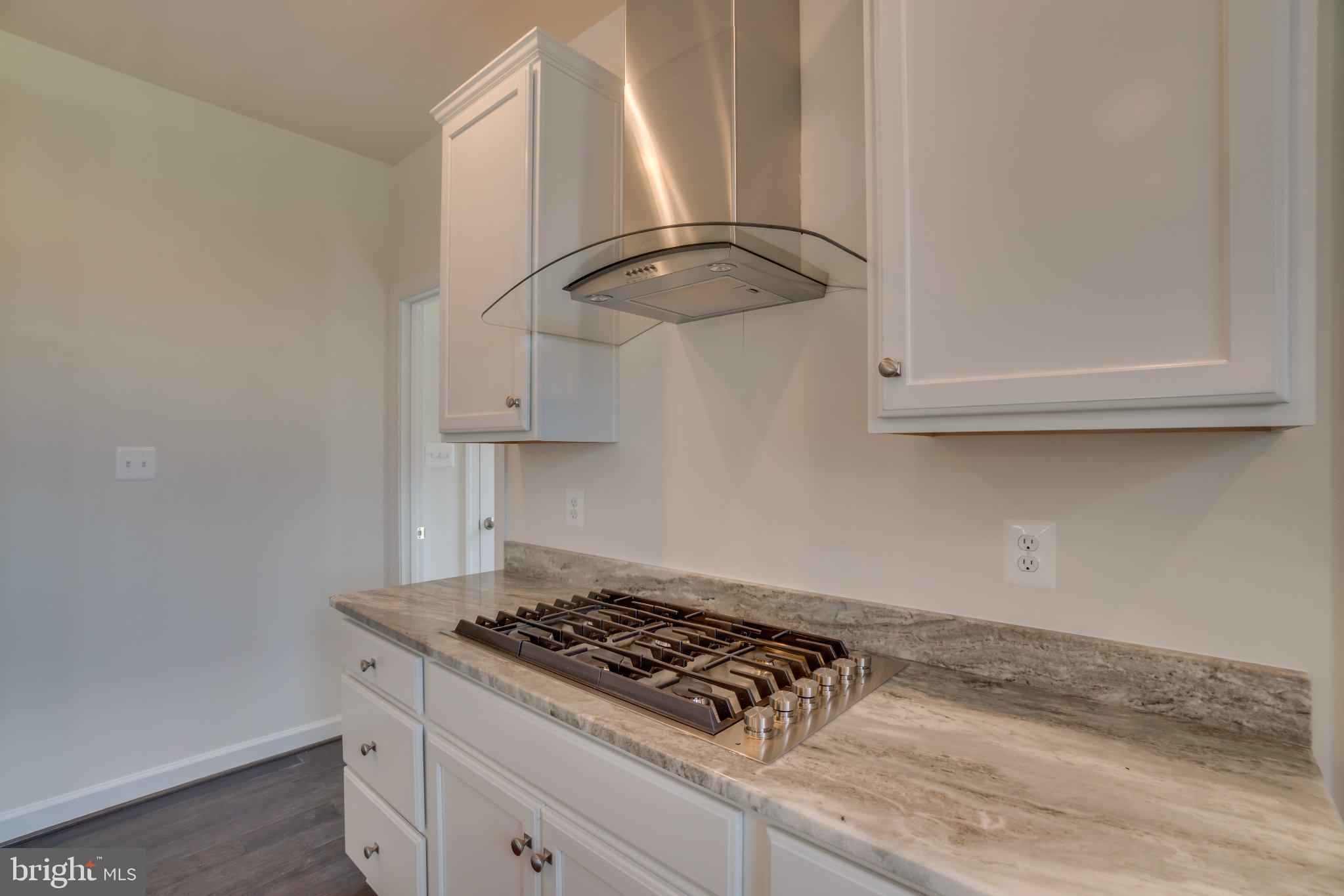 499 Joshua Road Stafford, VA 22556 - Photo 4 of 37 Sleek kitchen with modern finishes.