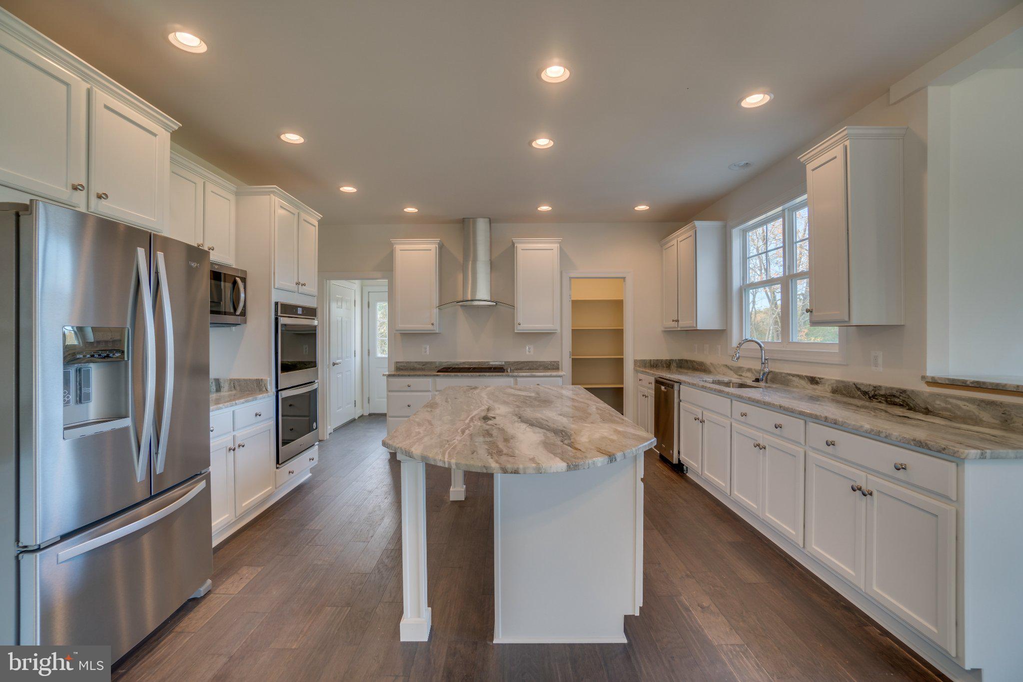 499 Joshua Road Stafford, VA 22556 - Photo 9 of 37 Modern kitchen with elegant finishes.