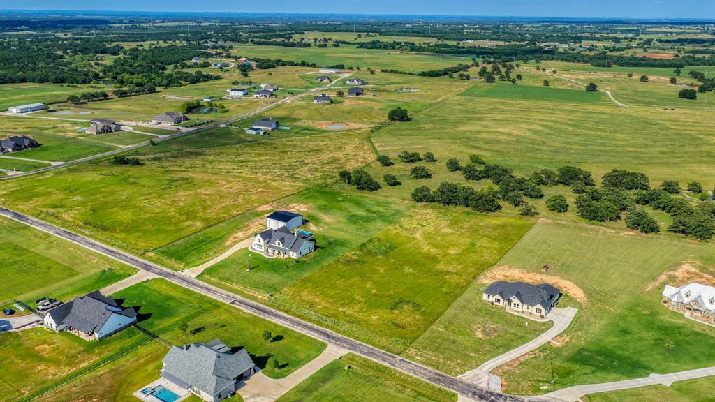 2013 Swallowtail Court Poolville, TX 76487 - Photo 3 of 12 a view of a pool an ocean