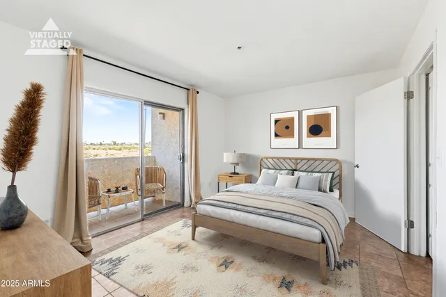 a bedroom with a bed and a cabinets