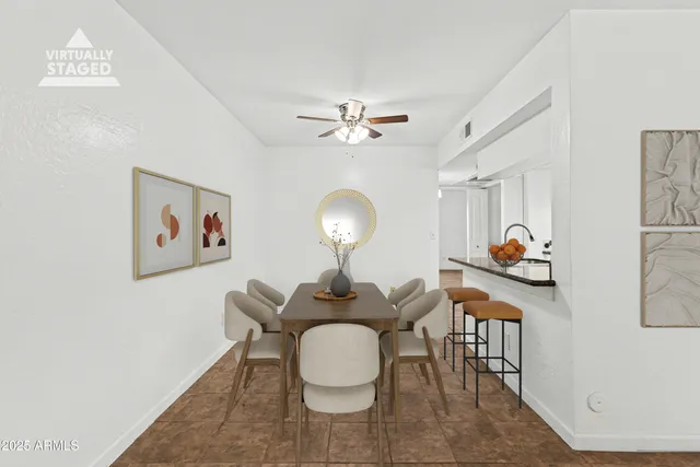 a workspace with furniture and a lamp