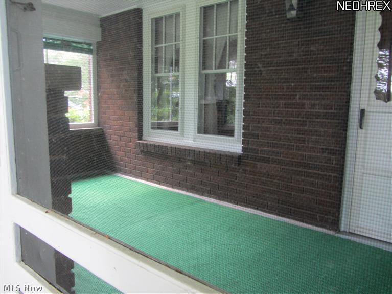 917 Waterloo Road Mogadore, OH 44260 - Photo 20 of 21 The screened in front porch is fabulous.