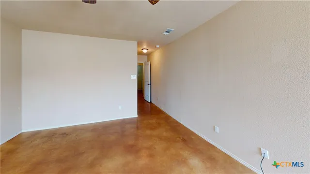 a view of a room with a wardrobe