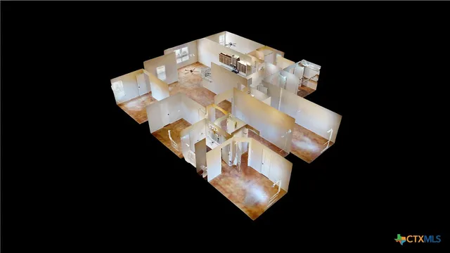 a kitchen with granite countertop a refrigerator and a sink