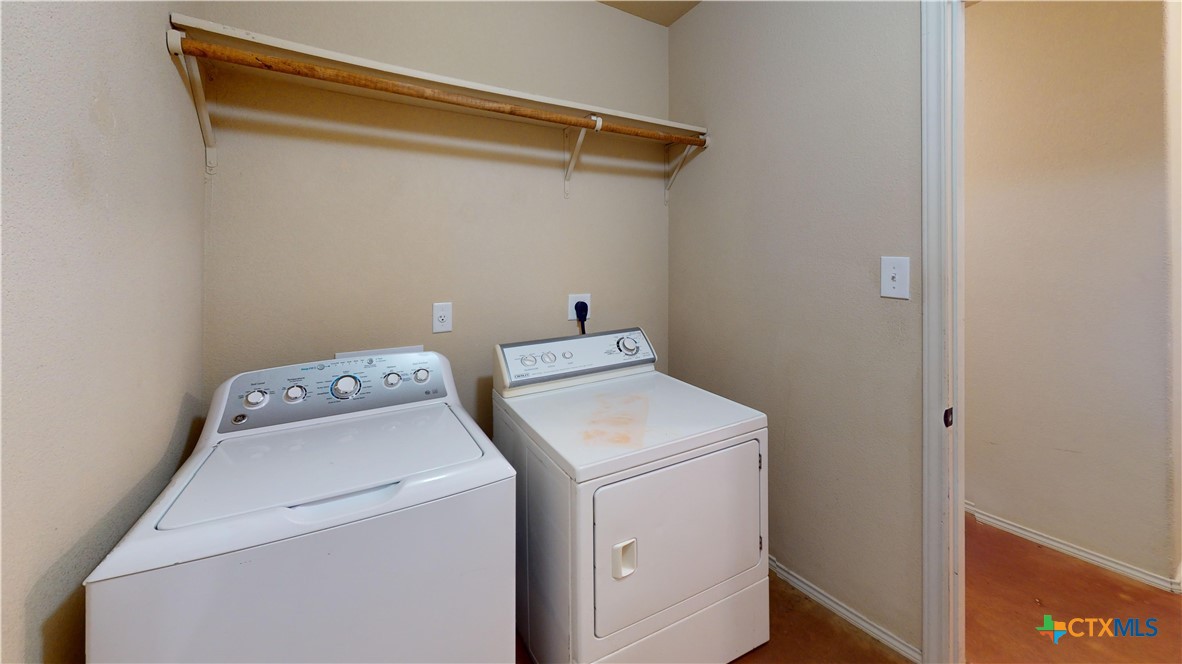 3401 Plateau Street Copperas Cove, TX 76522 - Photo 22 of 32 a utility room with dryer and washer