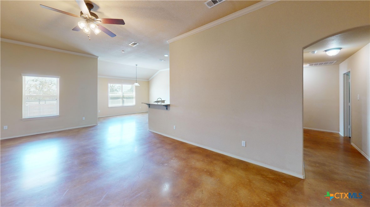 3401 Plateau Street Copperas Cove, TX 76522 - Photo 5 of 32 an empty room with wooden floor and windows