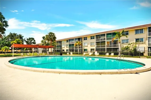 a view of a house with a swimming pool