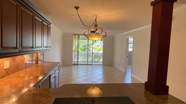 a room with wooden floor and window