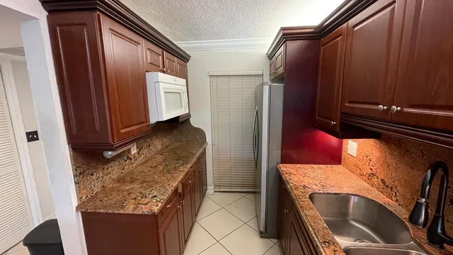 a view of washer and utility room