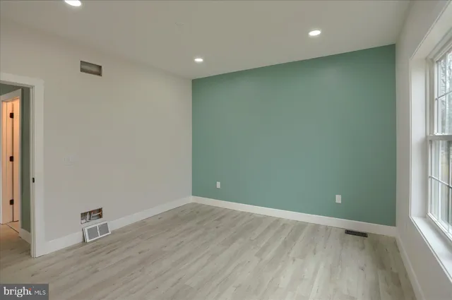 a view of a bathroom with a toilet and a sink