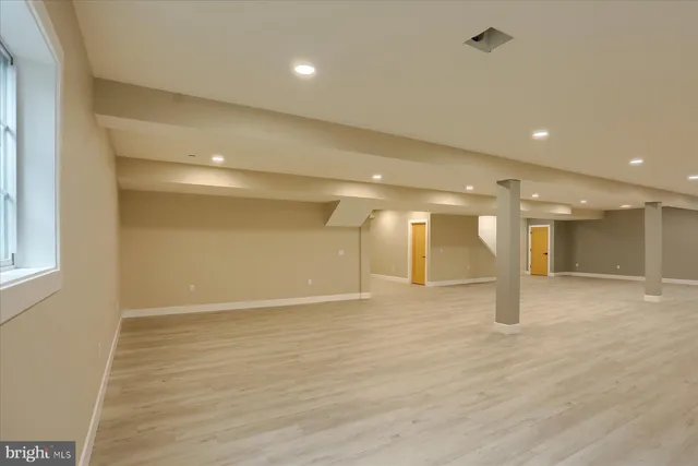 a bathroom with a shower and toilet
