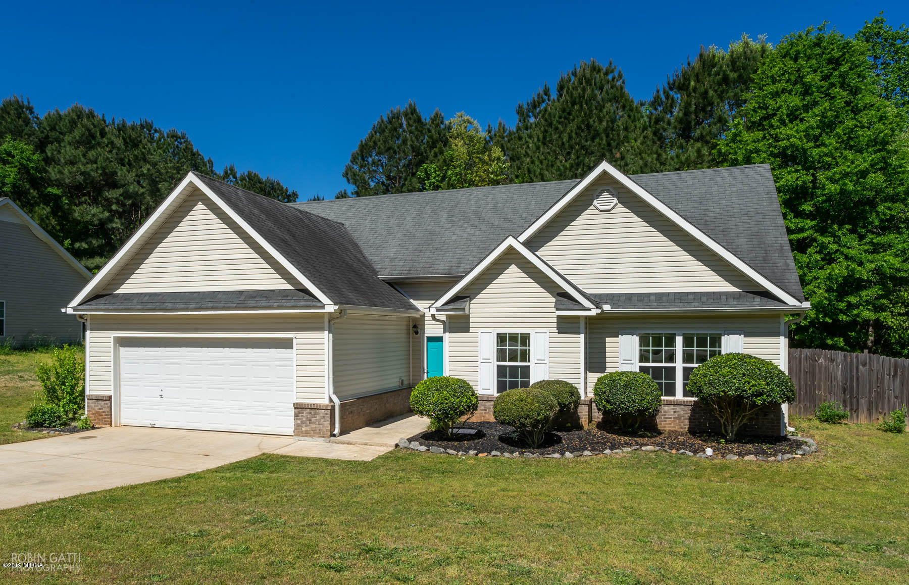 101 Hickory Road Jackson, GA 30233 - Photo 2 of 32 a front view of a house with a yard