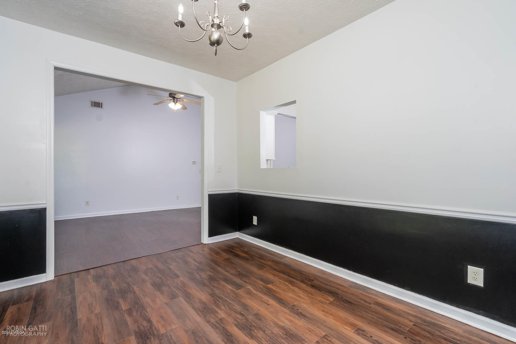 101 Hickory Road Jackson, GA 30233 - Photo 11 of 32 wooden floor in an empty room