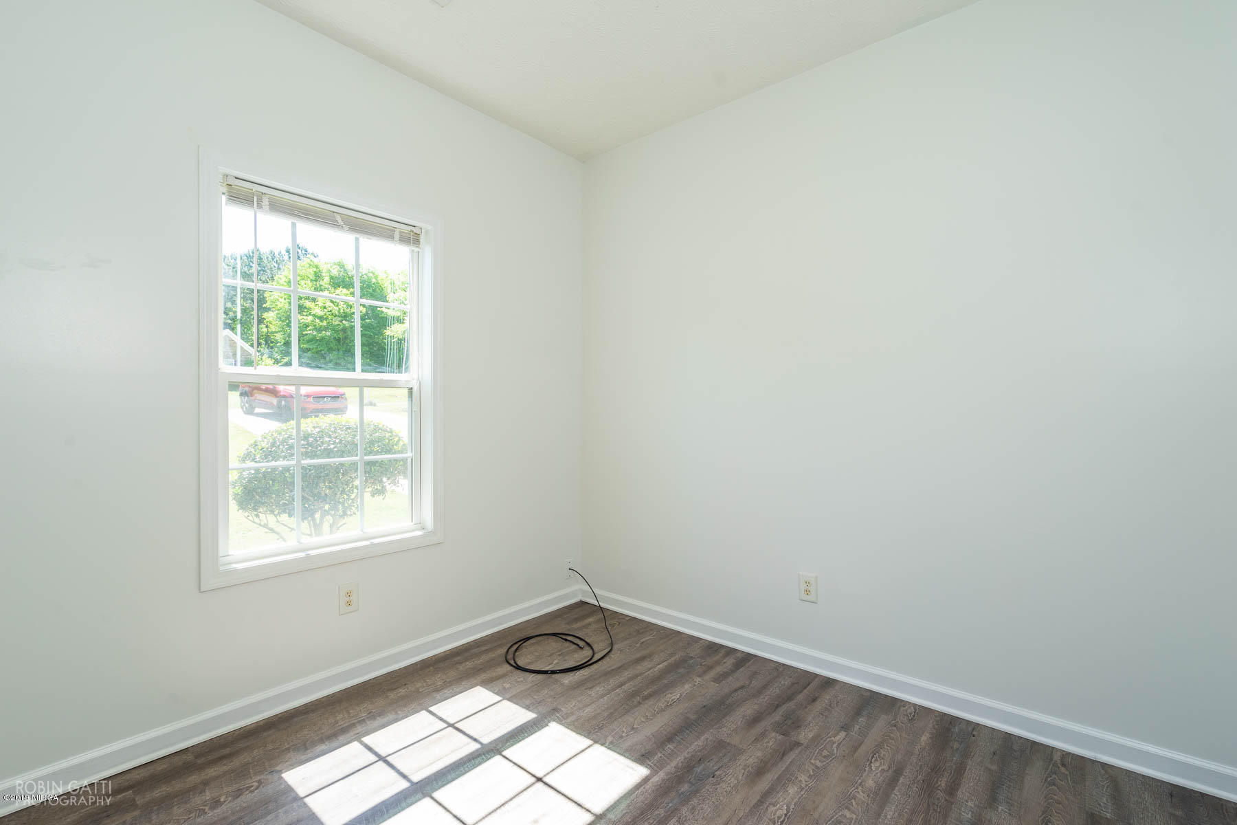 101 Hickory Road Jackson, GA 30233 - Photo 16 of 32 an empty room with a window