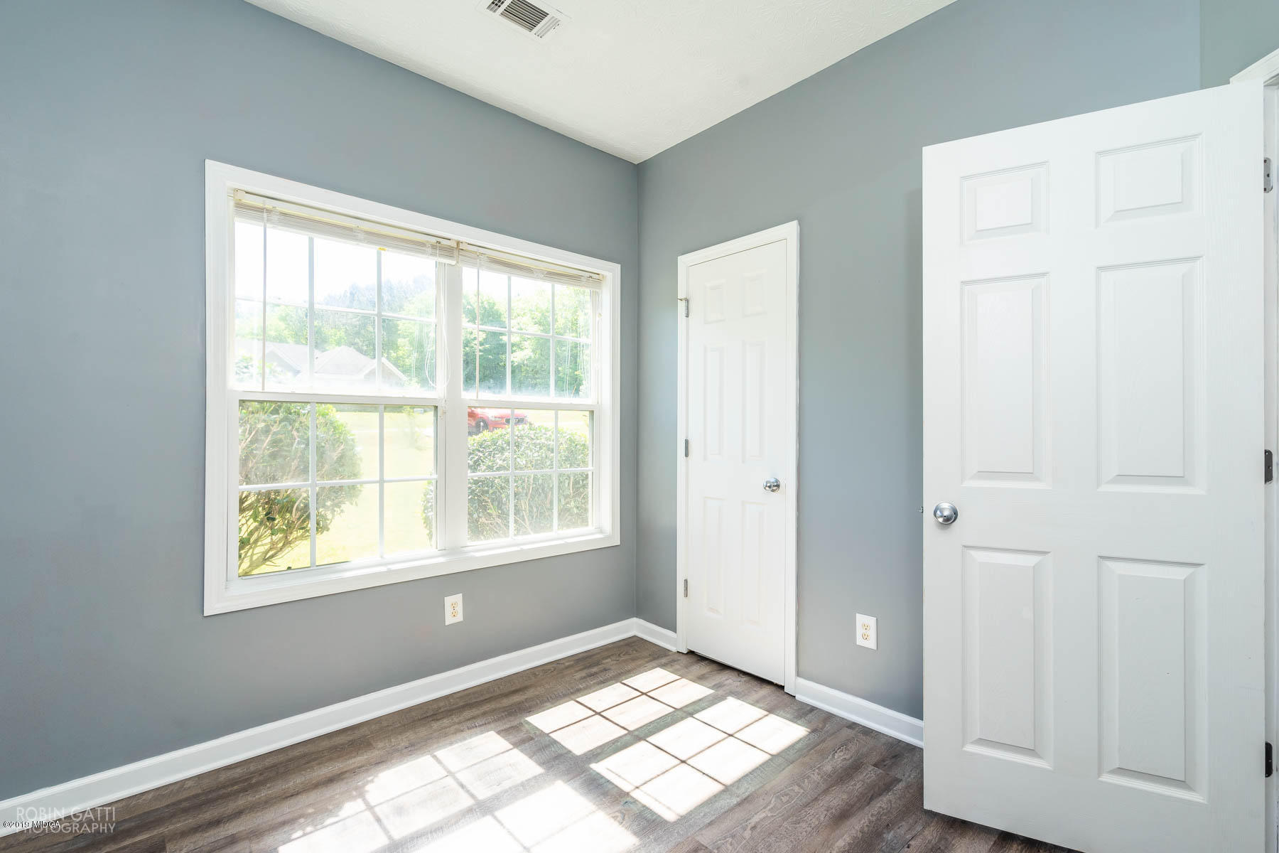 101 Hickory Road Jackson, GA 30233 - Photo 19 of 32 a view of an empty room and window