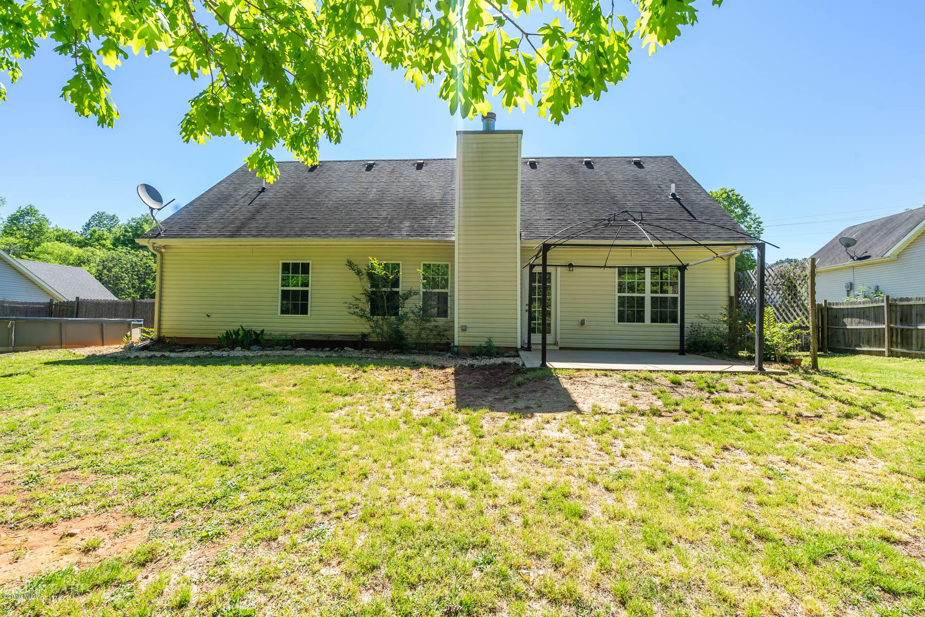 101 Hickory Road Jackson, GA 30233 - Photo 22 of 32 front view of a house with a yard