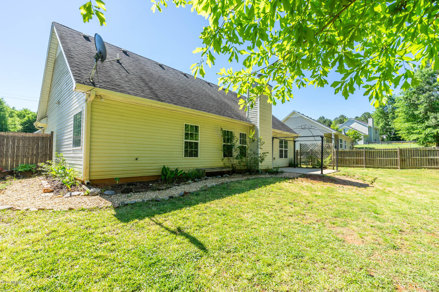 101 Hickory Road Jackson, GA 30233 - Photo 23 of 32 a front view of a house with a yard