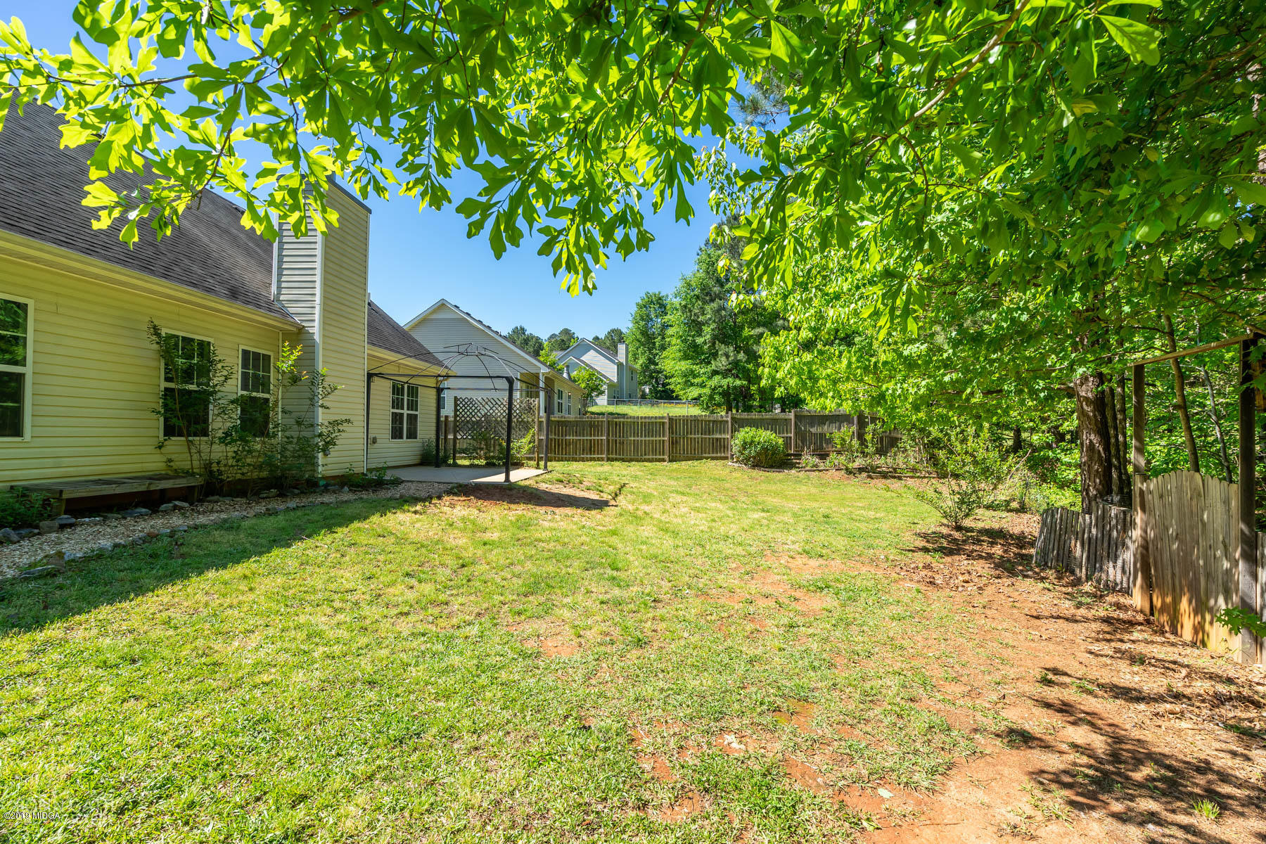 101 Hickory Road Jackson, GA 30233 - Photo 24 of 32 a house view with a garden space