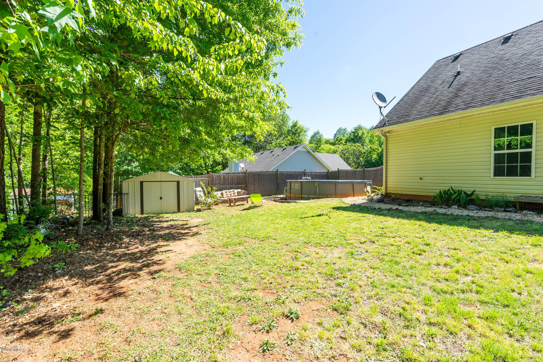 101 Hickory Road Jackson, GA 30233 - Photo 25 of 32 a front view of a house with a yard