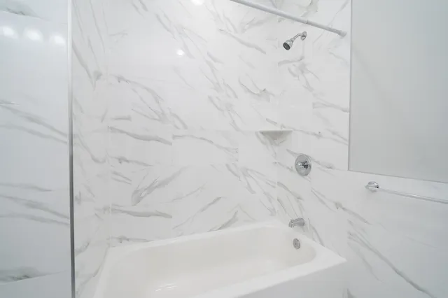 a bathroom with a bathtub