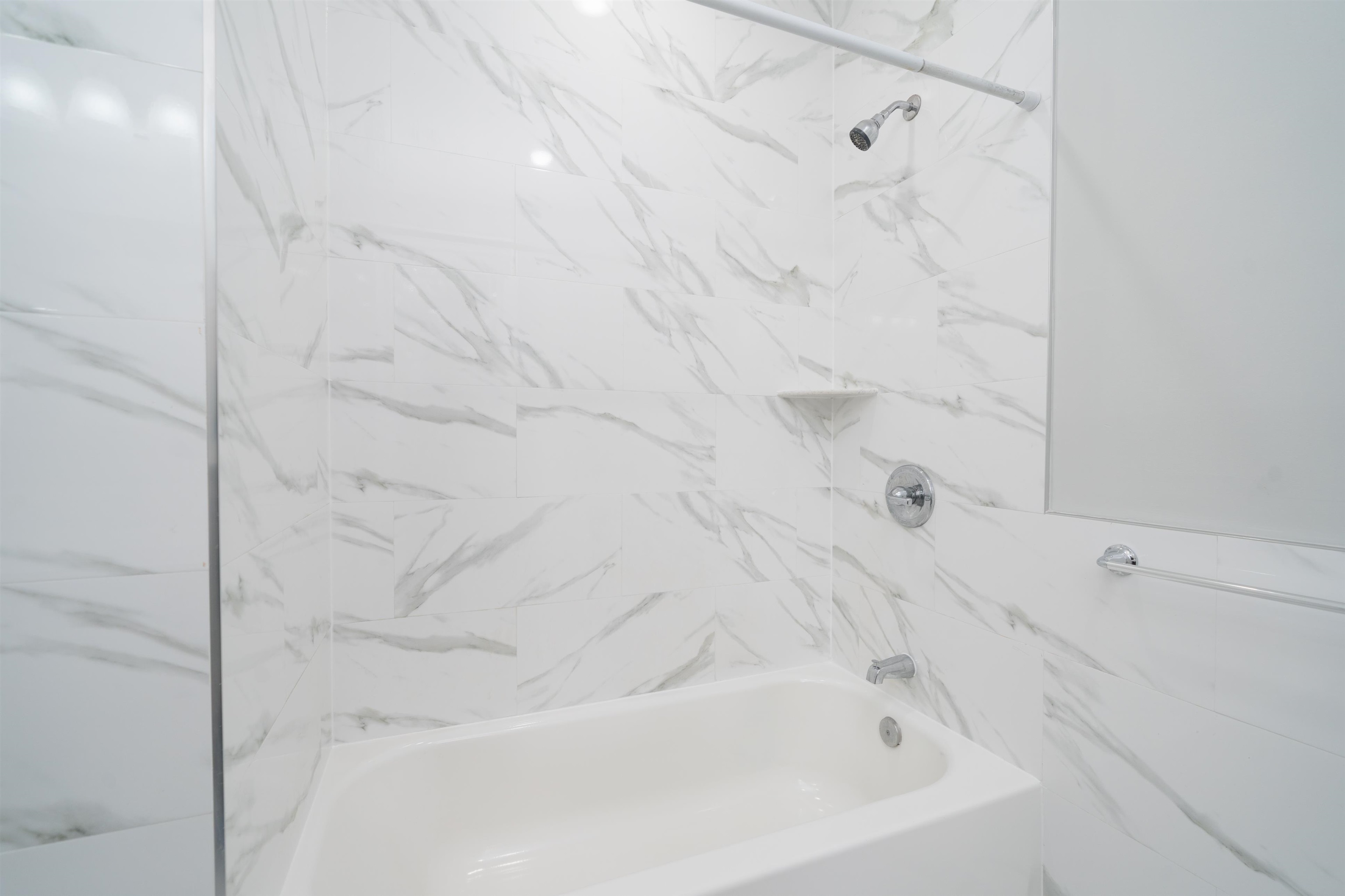 408 Monastery Place, Unit 2 Union City, NJ 07087 - Photo 12 of 21 a bathroom with a bathtub