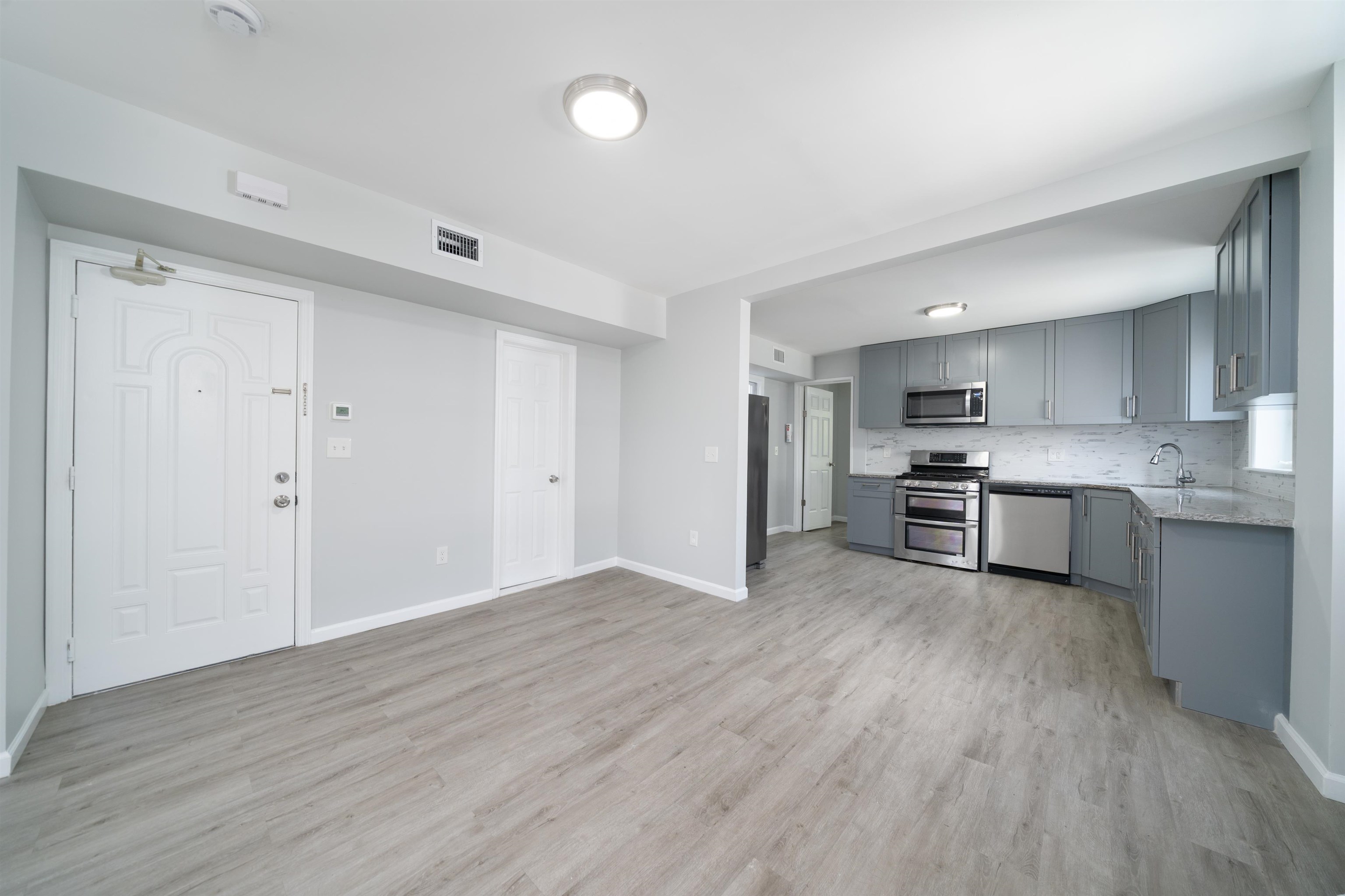 408 Monastery Place, Unit 2 Union City, NJ 07087 - Photo 2 of 21 a view of kitchen with wooden floor