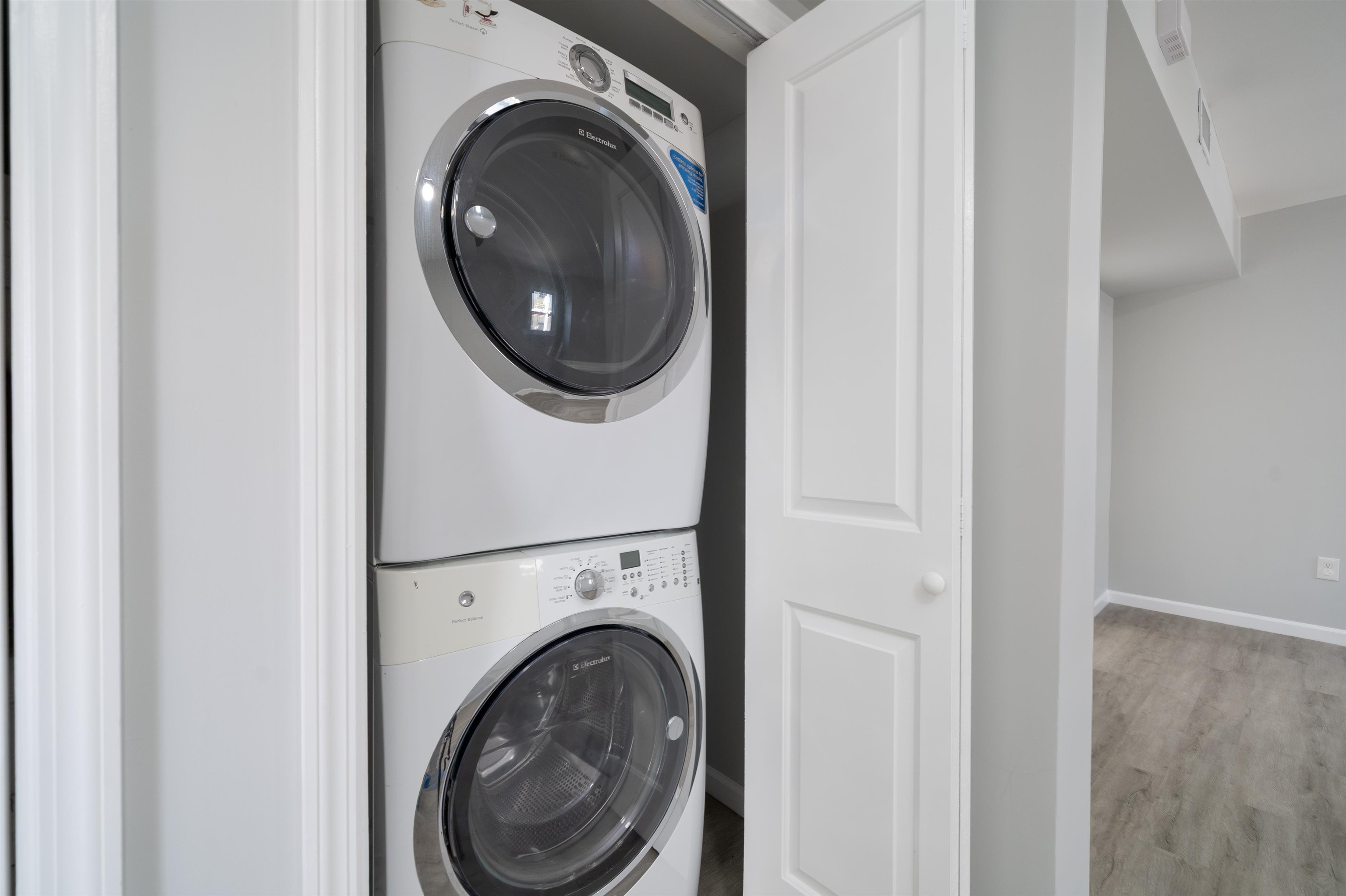 408 Monastery Place, Unit 2 Union City, NJ 07087 - Photo 8 of 21 a view of a hallway with washer and dryer