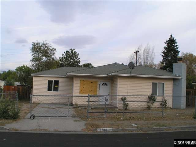 1916 Citron Street Reno, NV 89512 - Photo 1 of 3 a front view of house with yard