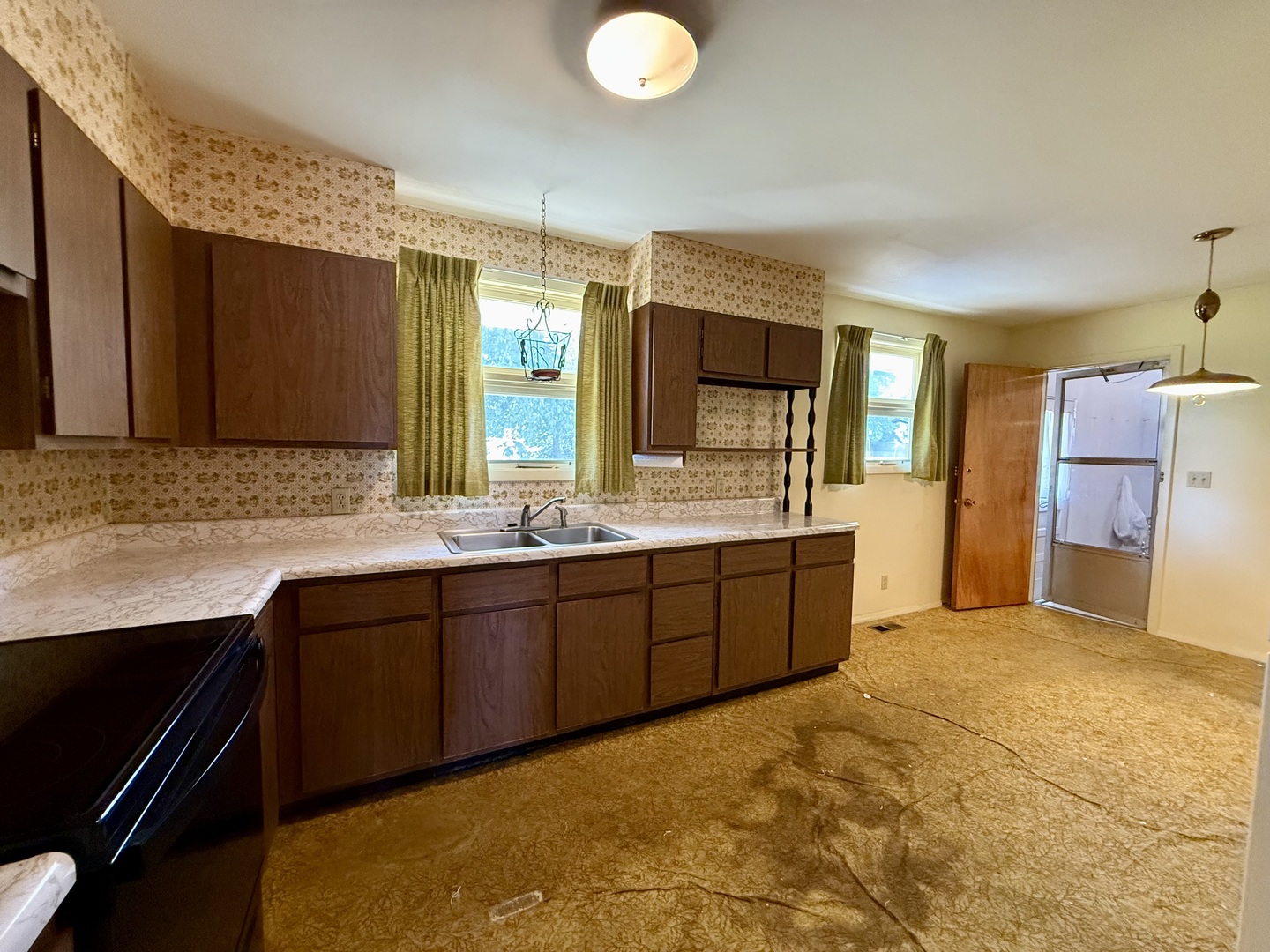1612 Carolina Drive Rantoul, IL 61866 - Photo 5 of 18 a spacious bathroom with a granite countertop sink and a mirror