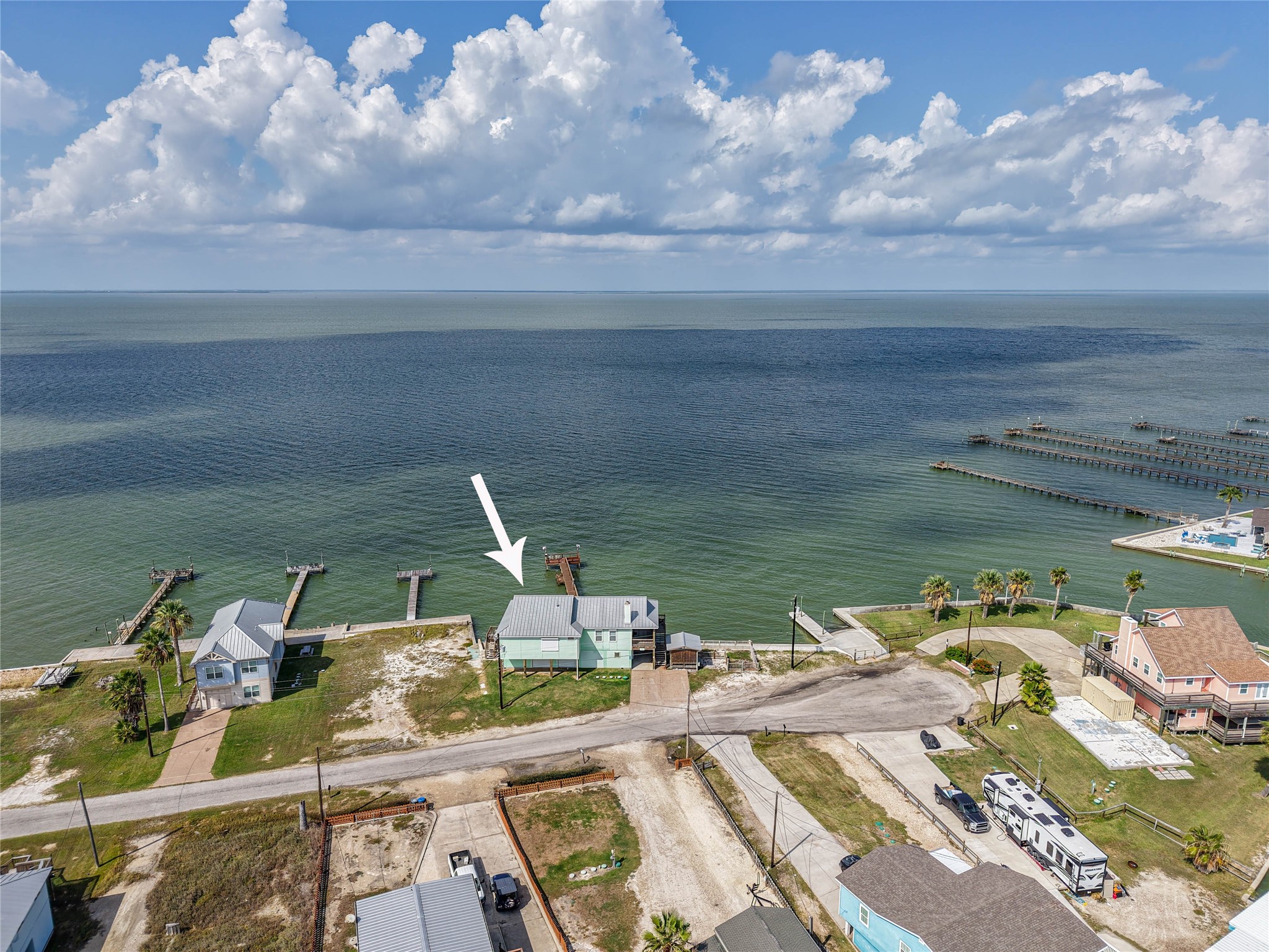 740 Copano Cove Road Rockport, TX 78382 - Photo 11 of 35 a view of a lake with furniture