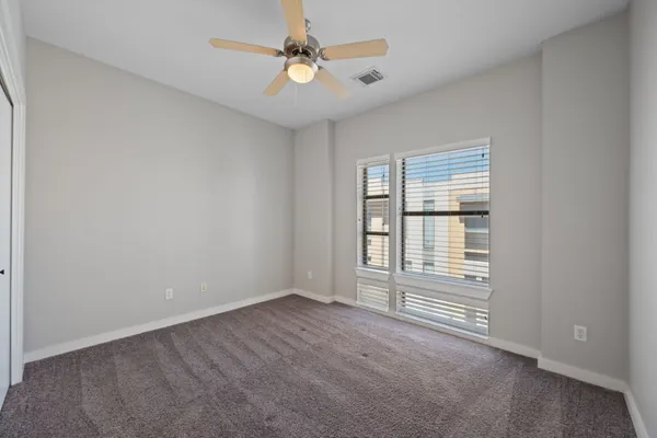 a view of a hallway with washer and dryer