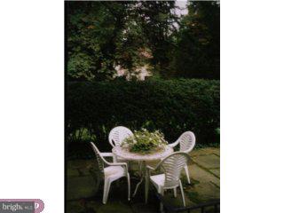 360 Jefferson Road Princeton, NJ 08540 - Photo 4 of 4 a table and chairs in a patio