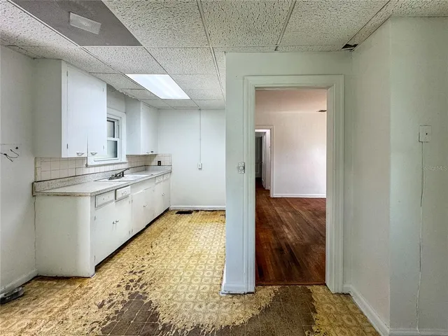 a view of a kitchen with a sink