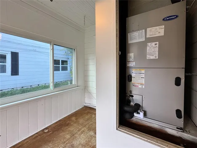 a view of a closet area with furniture