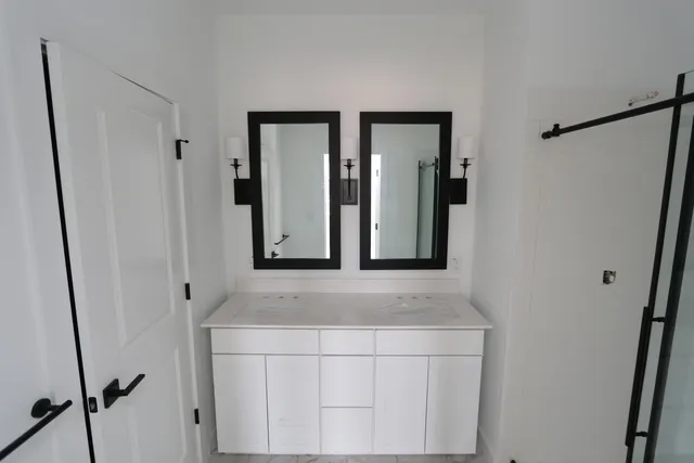 a view of an entryway with wooden floor