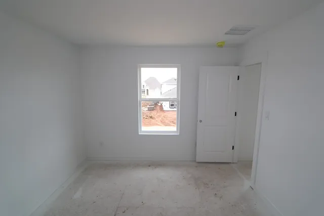 an empty room with a window