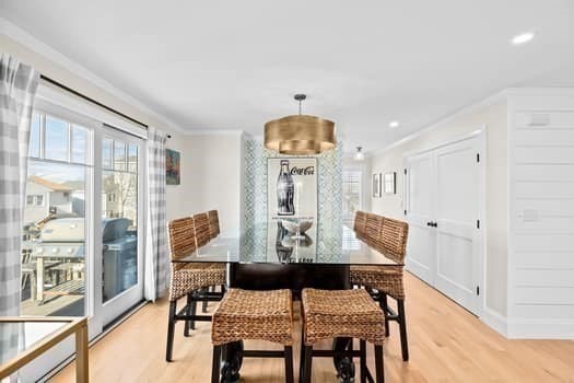 5 Vernon Avenue Hull, MA 02045 - Photo 5 of 33 a view of a dining room with furniture and wooden floor