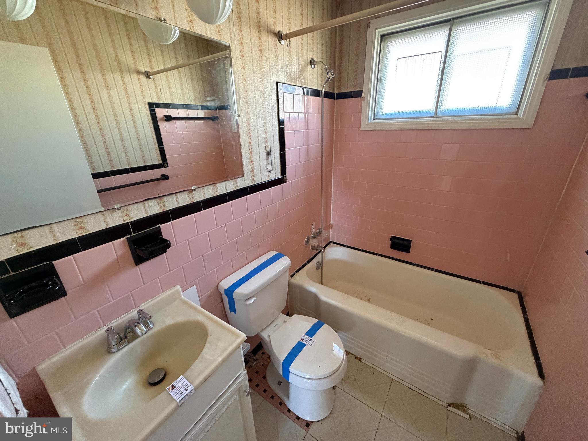 3 Bright Circle Baltimore, MD 21207 - Photo 5 of 14 a bathroom with a sink toilet and mirror