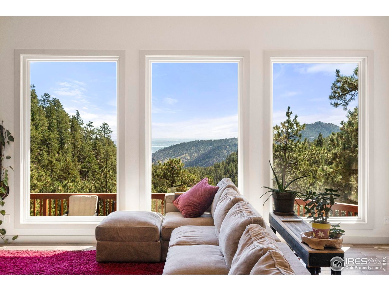 524 Cutter Lane Boulder, CO 80302 - Photo 11 of 49 a living room with furniture large window and a potted plant