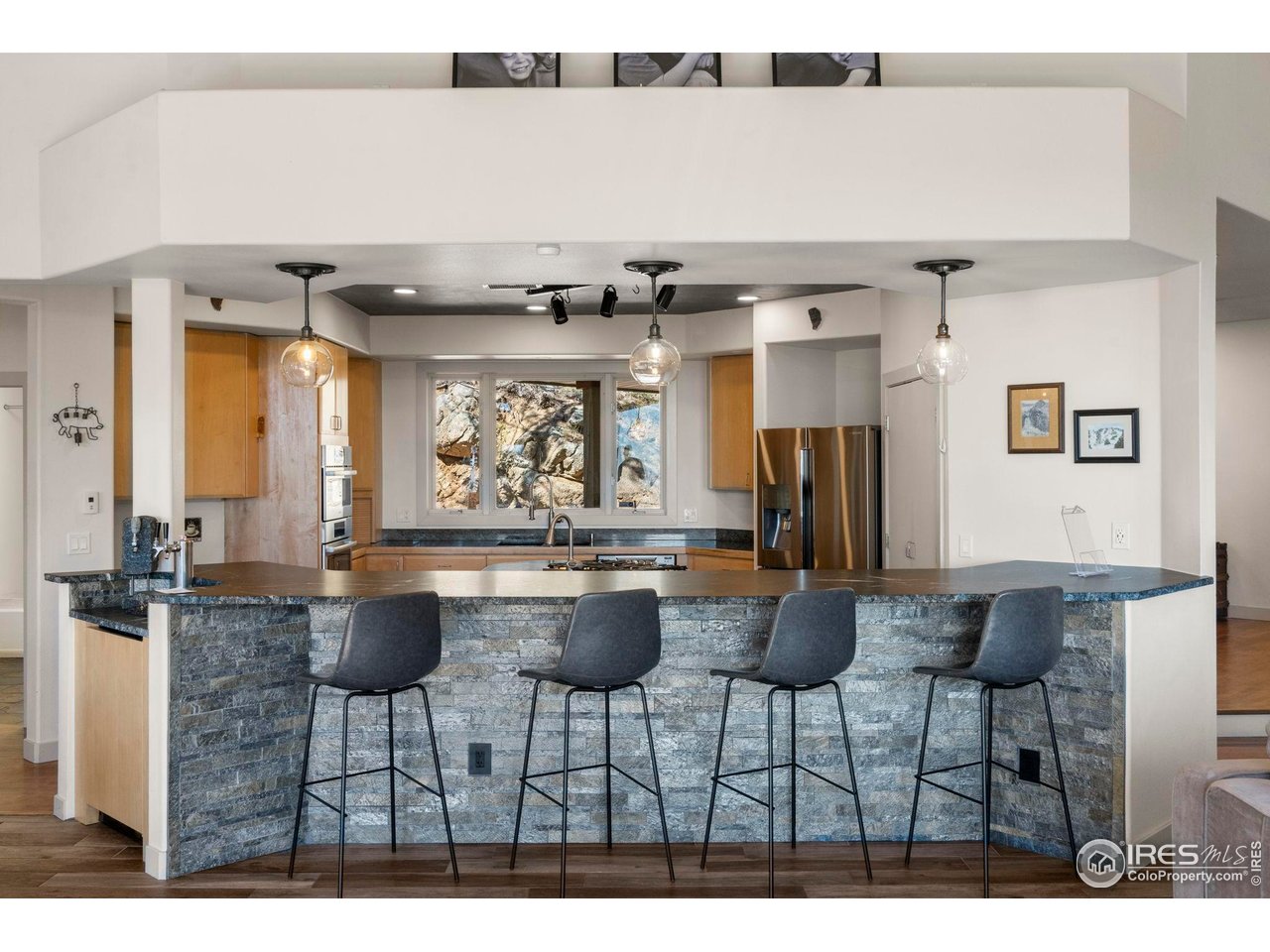 524 Cutter Lane Boulder, CO 80302 - Photo 14 of 49 a large kitchen with a table and chairs