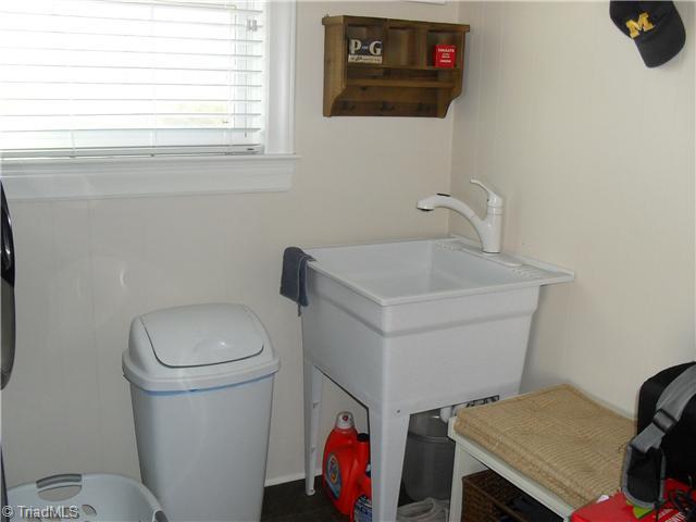 2457 Fairview Farm Road Asheboro, NC 27205 - Photo 12 of 15 Laundry Room. Huge Mud Rm coming in from carport. Sink area and also a closet.